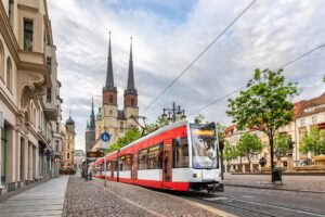 Red tram on Hallmarkt square in Halle (Saale), Germany