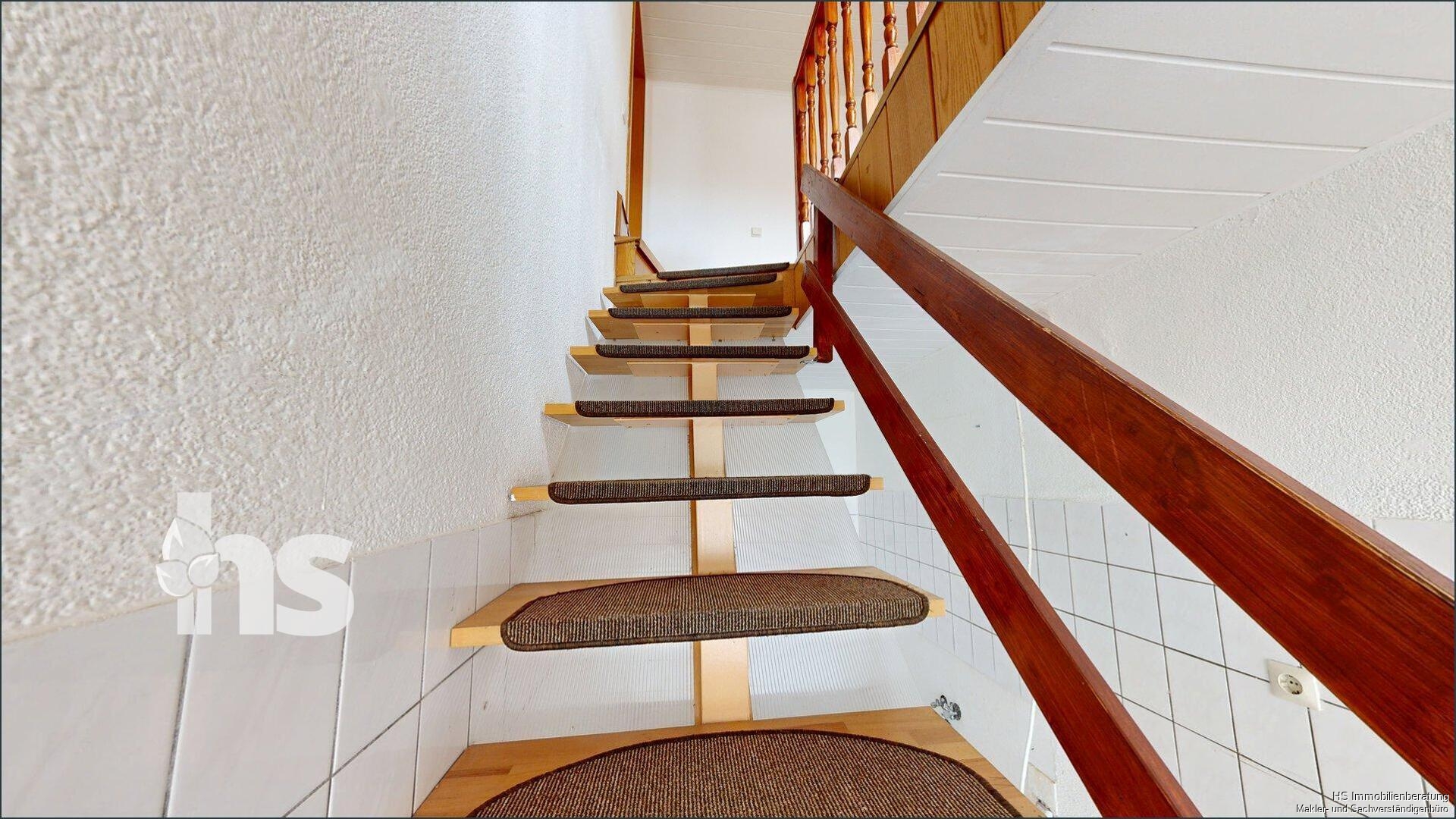 Treppe ins Obergeschoss