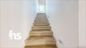 Treppe ins Obergeschoss